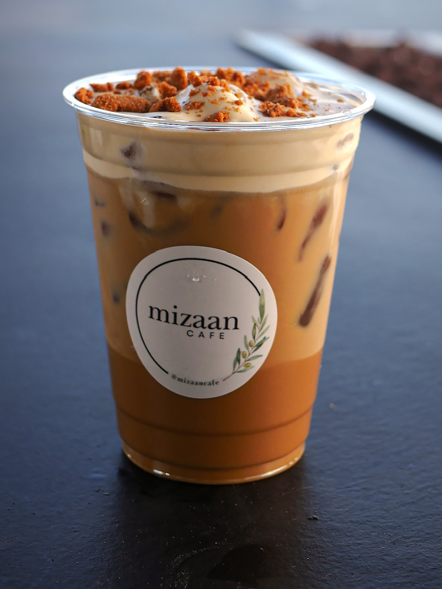 Iced espresso latte topped with cookie butter cream
